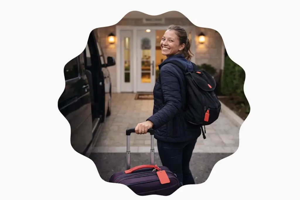 Traveler arriving with a suitcase