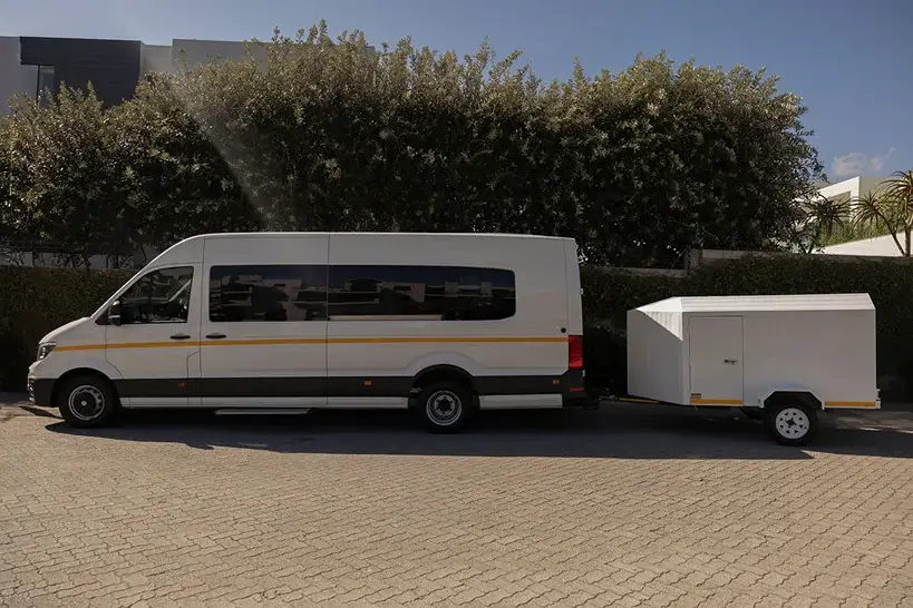 wolf shuttles minivan with trailer